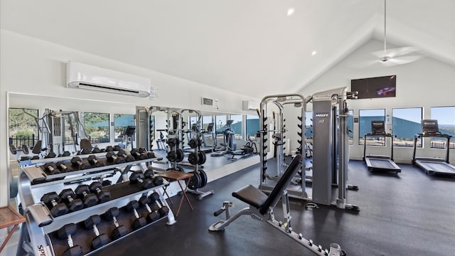 gym featuring a wall unit AC, ceiling fan, and high vaulted ceiling