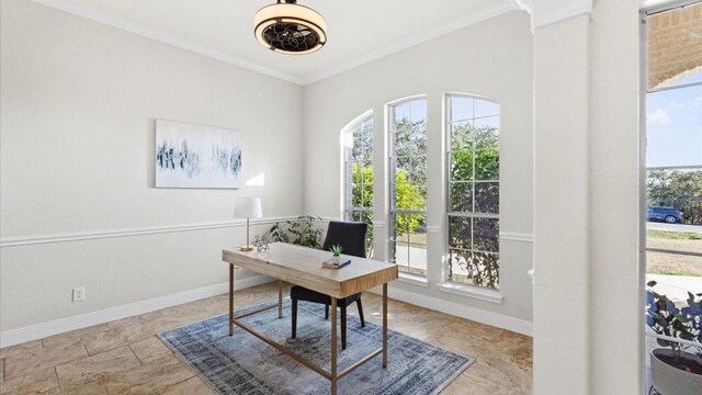 home office featuring plenty of natural light and crown molding