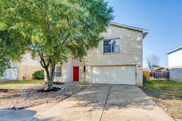 front of property with a garage