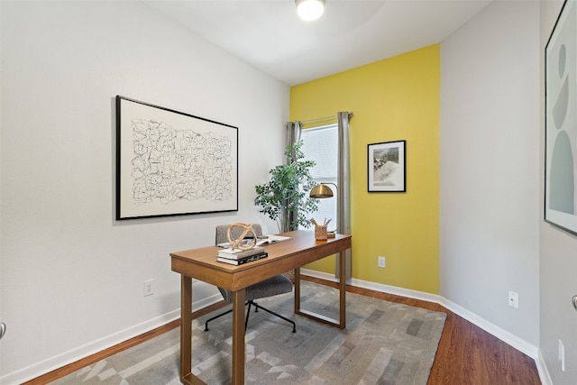 home office featuring hardwood / wood-style flooring