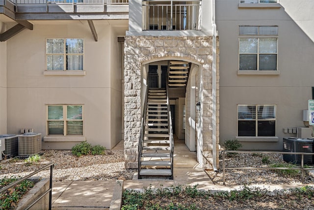 property entrance featuring cooling unit