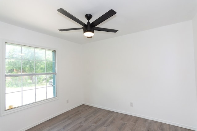 spare room with light hardwood / wood-style flooring and ceiling fan