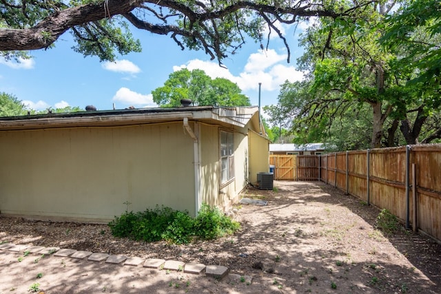 view of side of property featuring central AC unit