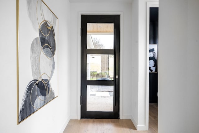 doorway to outside featuring light wood-type flooring