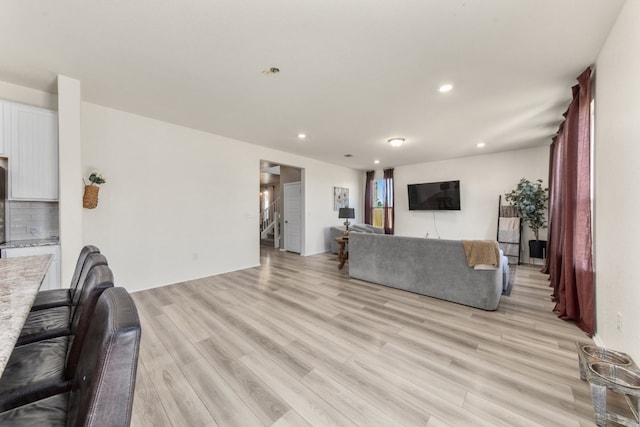 living room featuring light wood-type flooring