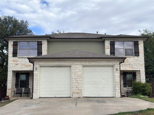 view of front of home featuring a garage