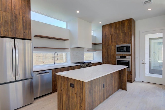 2618 E 4th St, Austin, TX 78702 - kitchen with open shelves, stainless steel appliances, a sink, modern cabinets, and recessed lighting