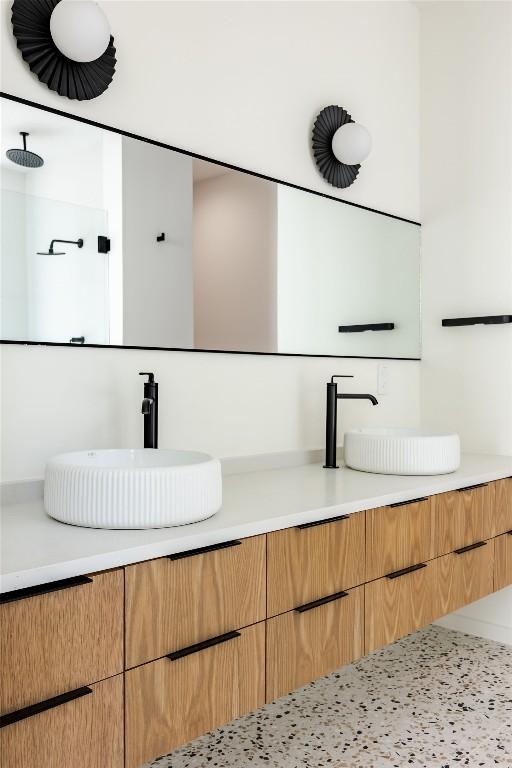 2114 Lawnmont Ave, Austin, TX 78756 - bathroom with double vanity and a shower