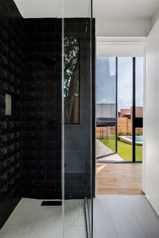 2114 Lawnmont Ave, Austin, TX 78756 - doorway to outside with wood finished floors