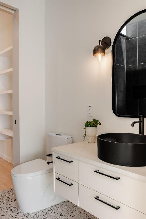 2114 Lawnmont Ave, Austin, TX 78756 - bathroom featuring vanity and toilet