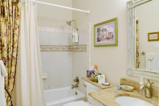 full bathroom featuring shower / bath combo, vanity, and toilet