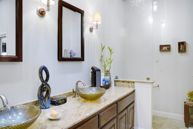 bathroom with vanity and tile patterned floors