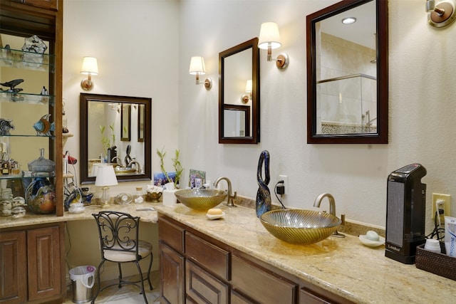 bathroom featuring vanity and walk in shower