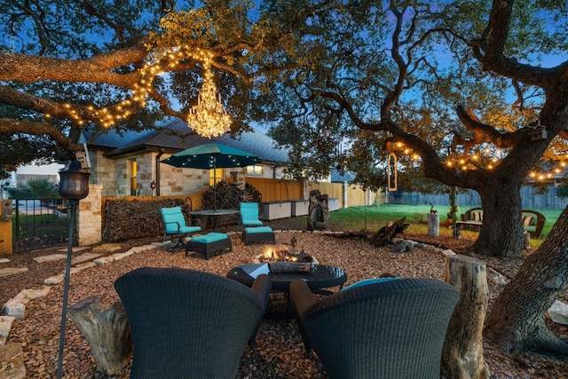 view of patio / terrace featuring a fire pit