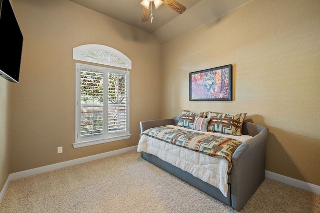 bedroom featuring carpet floors, ceiling fan, and lofted ceiling