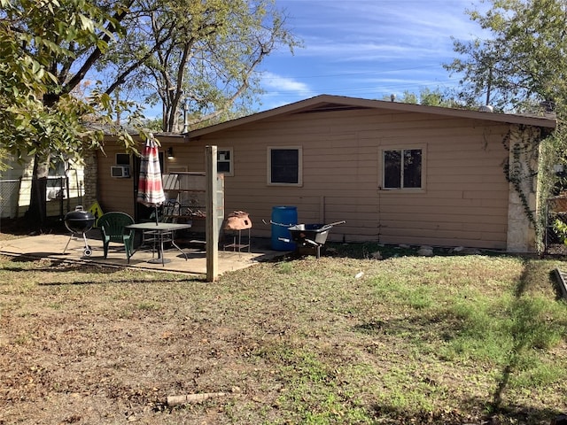 back of property with a patio area