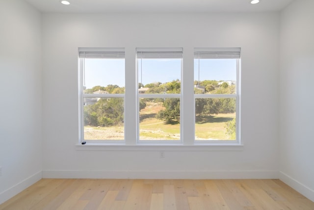 empty room featuring light hardwood / wood-style floors