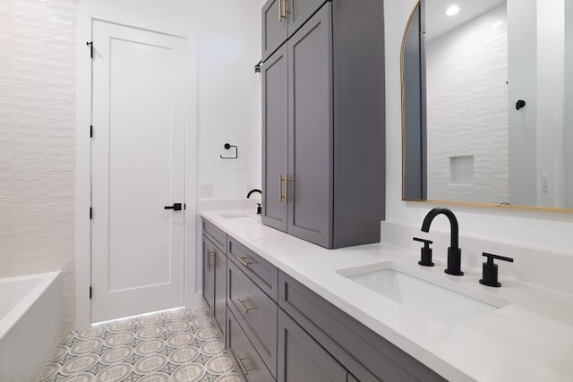 bathroom featuring vanity and a bathtub