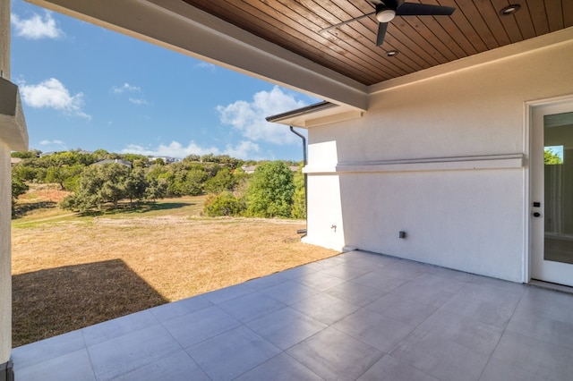 view of patio featuring ceiling fan