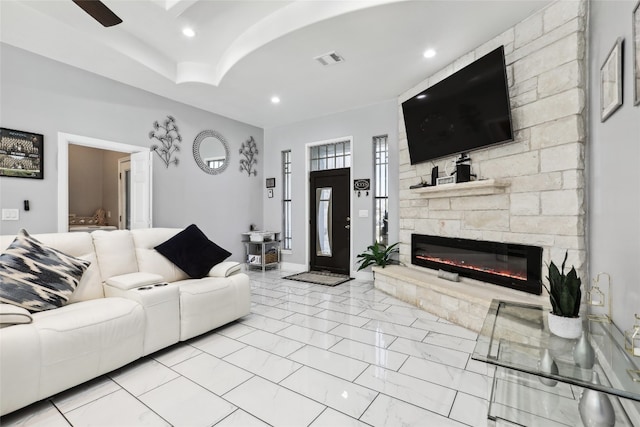 living room featuring a fireplace