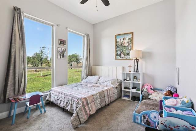 bedroom with ceiling fan and carpet