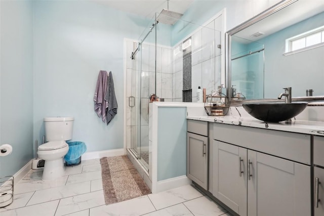 287 La Fortuna Dr, Del Valle, TX 78617 - full bathroom featuring marble finish floors, vanity, toilet, and a shower stall