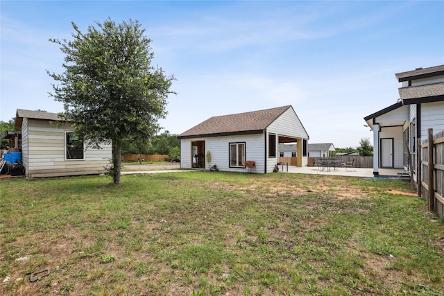 view of yard with a patio and an outdoor structure