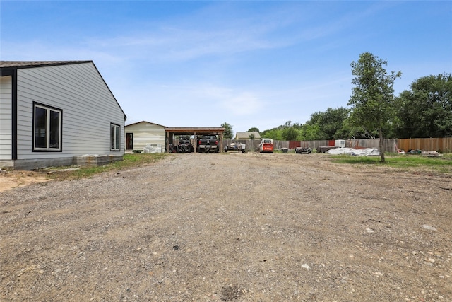 view of yard featuring a carport