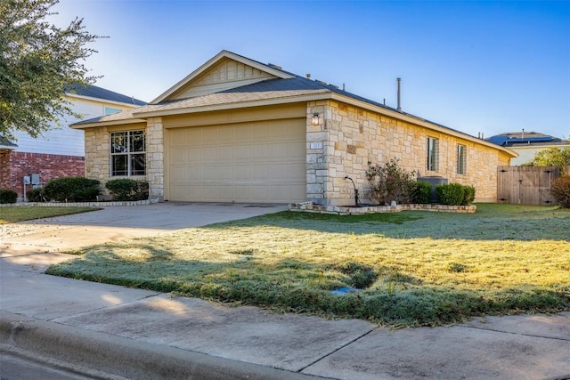 ranch-style house with a front yard and a garage