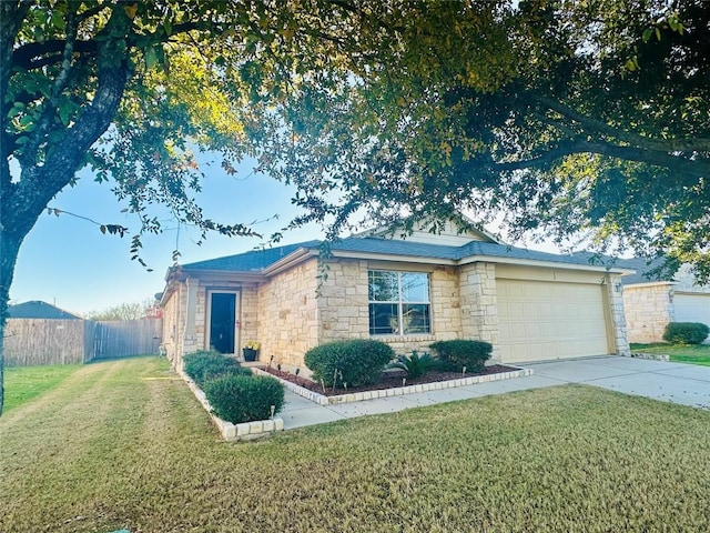 single story home featuring a front yard and a garage