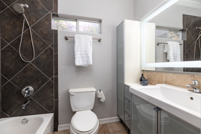 bathroom with tiled shower / bath combo and toilet