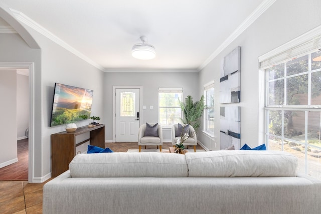 tiled living room featuring crown molding