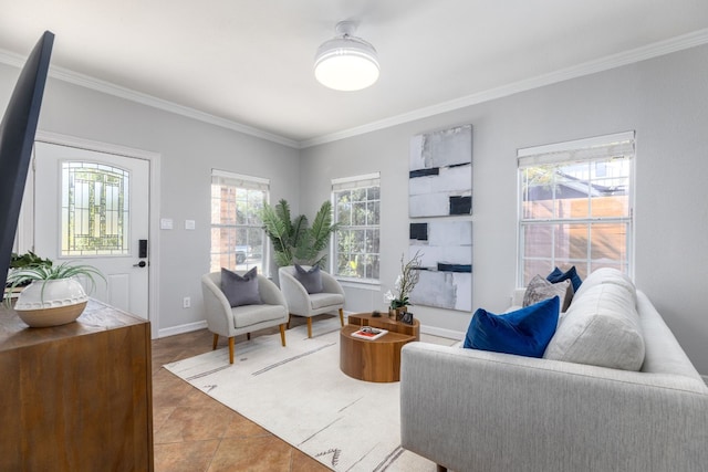 living room with tile patterned floors, a wealth of natural light, and ornamental molding