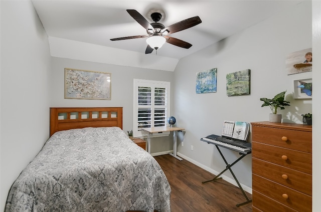 bedroom featuring ceiling fan, lofted ceiling, and dark wood-type flooring