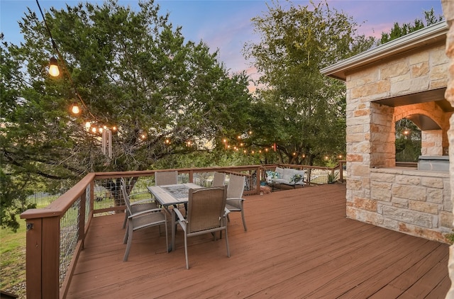 view of deck at dusk