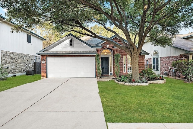 ranch-style home featuring a front yard and a garage