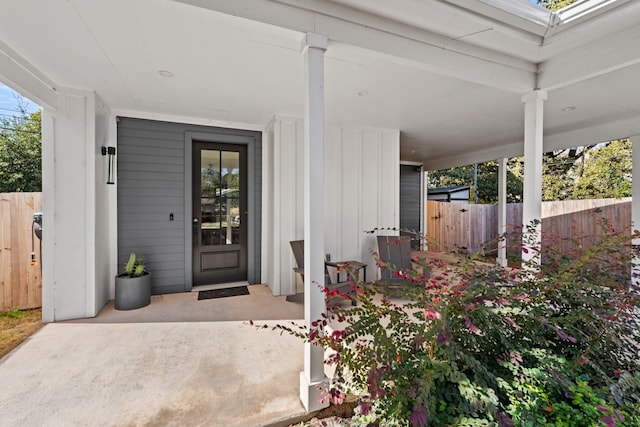 doorway to property with a porch