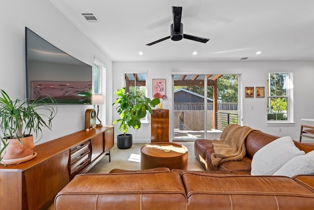 living room with ceiling fan