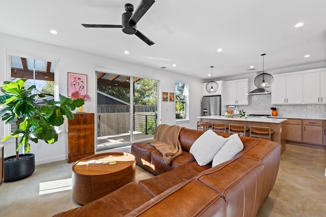 living room featuring ceiling fan