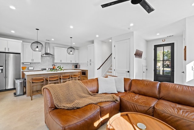 living room featuring ceiling fan