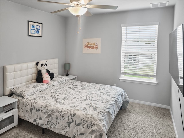 carpeted bedroom featuring ceiling fan