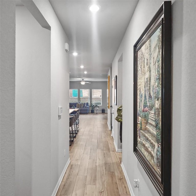 11303 Copper Spring Dr Unit 87, Austin, TX 78748 - hallway with light wood-style flooring and recessed lighting