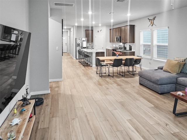 living room featuring light hardwood / wood-style floors