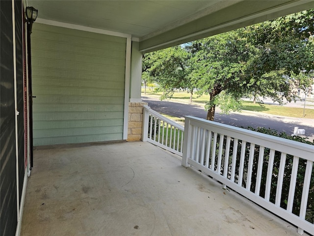 balcony featuring a porch