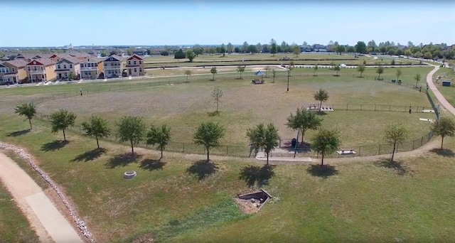 birds eye view of property with a rural view