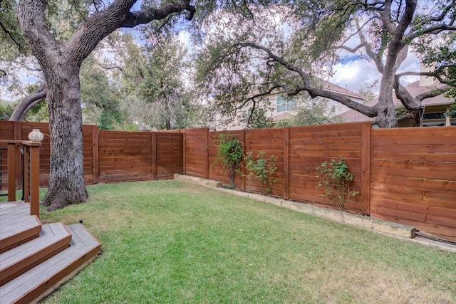 view of yard featuring a deck