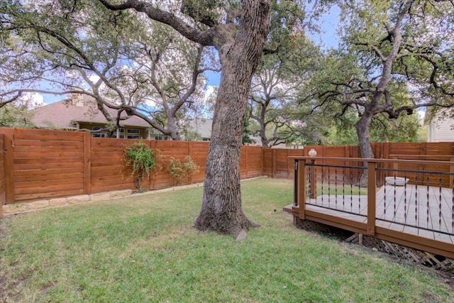 view of yard with a wooden deck