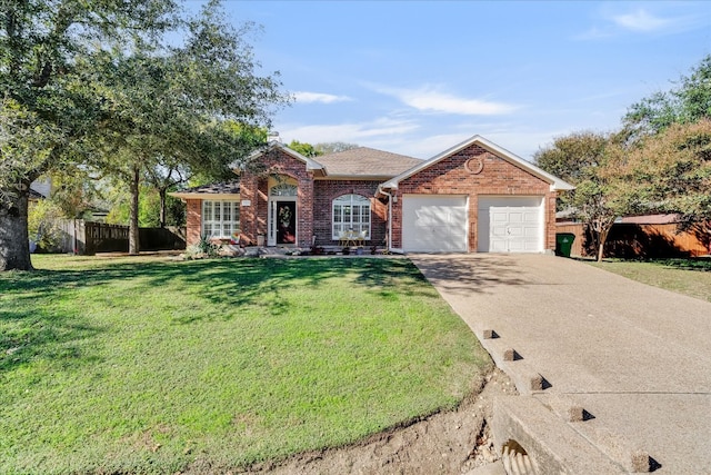 ranch-style home featuring a garage and a front lawn