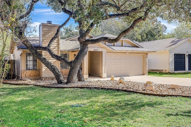 ranch-style home with a garage and a front lawn