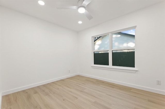 empty room featuring light hardwood / wood-style floors and ceiling fan